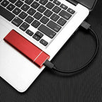 Portable SSD external hard drive with metal shell, slim design, compatible with PC, Mac, and gaming devices for fast data transfer and large storage