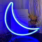 Blue moon neon sign glowing against a dark background, ideal for bedroom or party decor