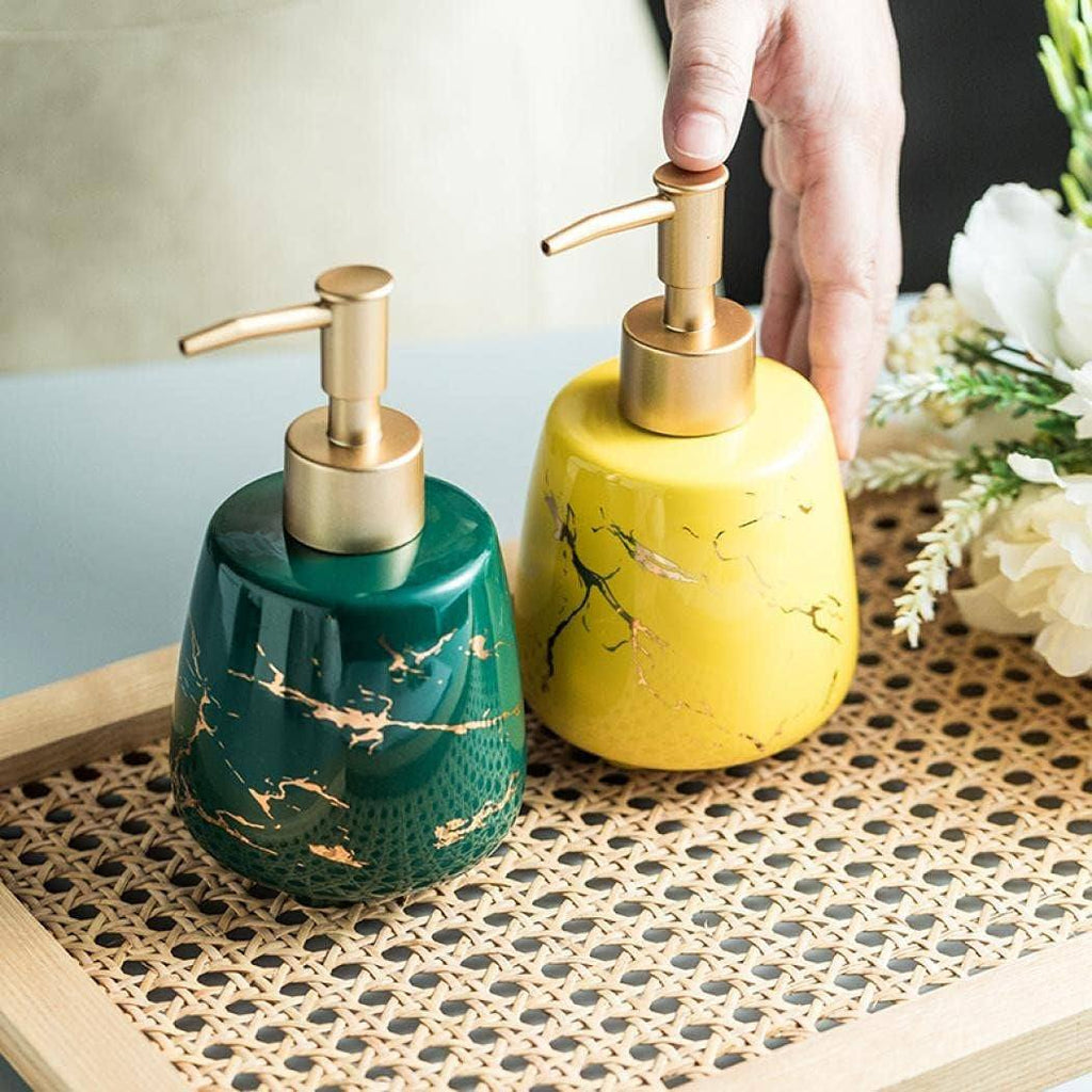White ceramic hand soap dispenser with marble design and pump for bathroom or kitchen use