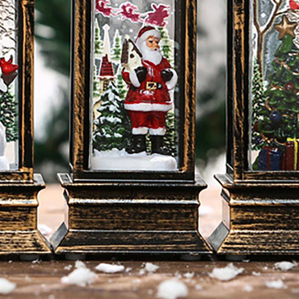 Festive lighted Christmas lantern with LED lights featuring Santa Claus, Christmas tree, and snow decorations