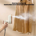 Compact white foldable mini ironing machine with steam and USB, ideal for travel and hanging clothes steaming