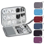 Gray LAVA waterproof travel cord organizer bag with multiple pockets and elastic loops for cables and gadgets